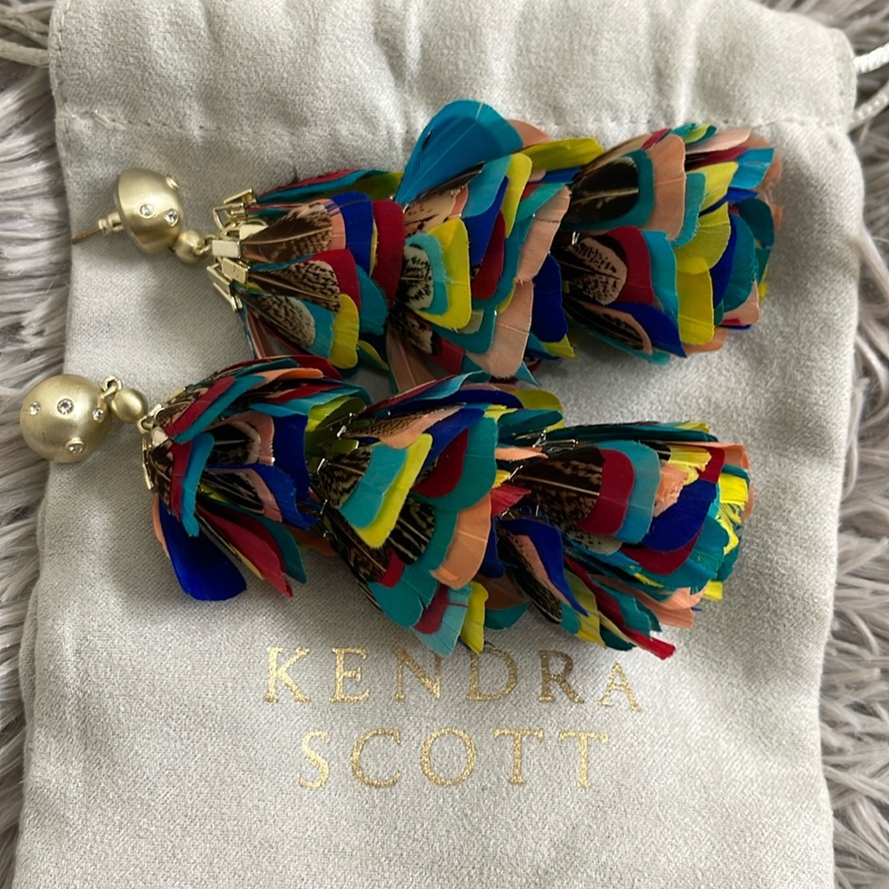 Kendra Scott feather earrings.